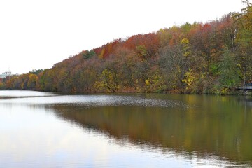 Fototapeta na wymiar lake among the mountains in autumn
