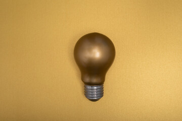 idea lamp gold with gold background