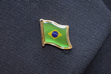 Brazil flag lapel pin on a suit