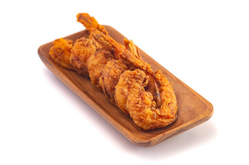 Breaded and Fried Jumbo Shrimp with Tails on a White Background