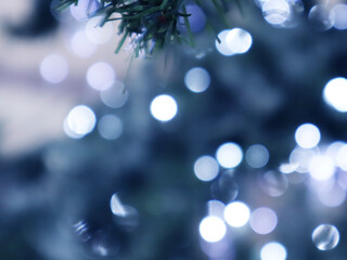 Christmas decorations - multicolored garlands. Selective soft focus. Snowflake from New Year's lanterns.