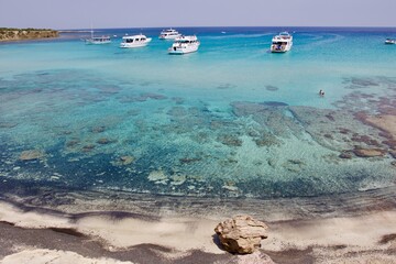boats on the blue lagoon beach in Cyprus 