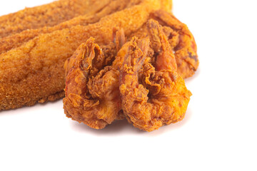 Breaded and Fried Fish Fillets and Shrimp on a White Background