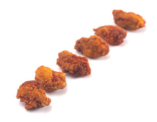 Breaded and Fried Oysters on a White Background
