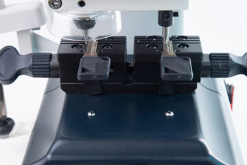 Production of home keys on a specialized vertical key machine.