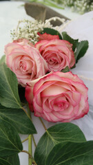 closeup of festive decoration with pink roses