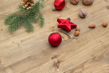 Beautiful festive Christmas background. New Year's holidays. Christmas Holidays. Beautiful red christmas decorations on wooden background