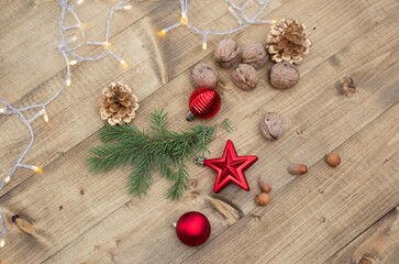Beautiful festive Christmas background. New Year's holidays. Christmas Holidays. Beautiful red christmas decorations on wooden background
