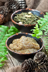 Homemade body scrub for peeling with sugar, olive oil and  green tea