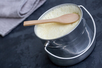 Turkish and Greek traditional dairy food yogurt or yoghurt in a pot (Goat yogurt)