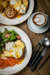 English breakfast, toast, poached egg, sauce, salmon
