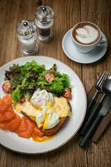 English breakfast, toast, poached egg, sauce, salmon
