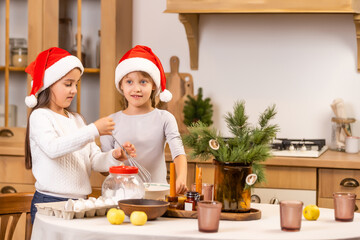 kids baking christmas cookies before the celebration of Christmas. Family