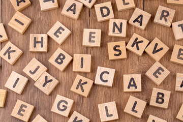 Alphabets on wooden cubes as a background