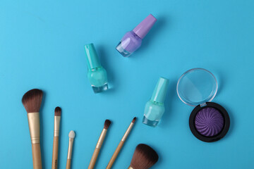 Set of decorative cosmetics on color background