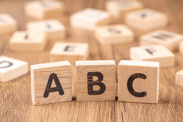 Alphabets on wooden cubes as a background