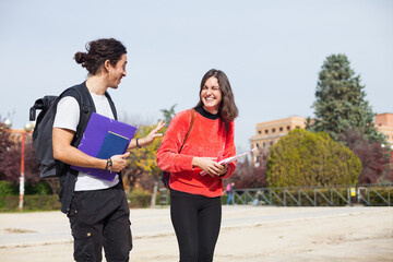 Obraz premium two happy university students at the school campus