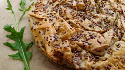 Delicious meat pie from puff pastry, which is traditionally prepared in the Balkans