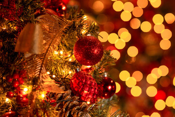 decorated Christams tree in red and golden colors