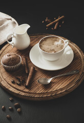 Delicious cappuccino in a cup on the table.