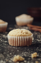 Muffins with banana and raisins on the table.