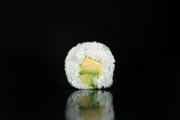 Sushi Rolls Set, maki, philadelphia and california rolls, on a Black background.
