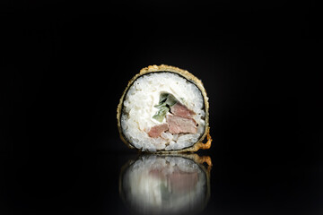 Fototapeta na wymiar Sushi Rolls Set, maki, philadelphia and california rolls, on a Black background.