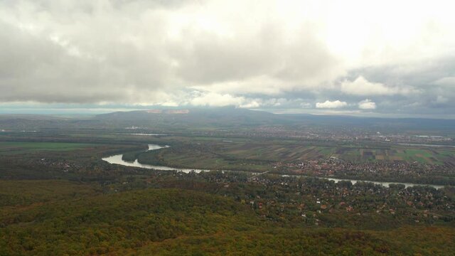 Panorama in Pilis from the V&ouml;r&ouml;s-kő to the bend of the Danube with clouds. 4K shot. 