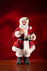Santa Claus decoration with red background. Christmas party.