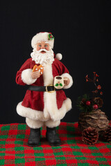 Santa Claus decoration with black background. Christmas party.