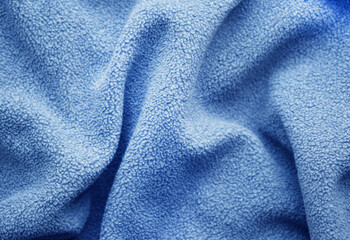 Fototapeta na wymiar Plush blue micro fleece background.