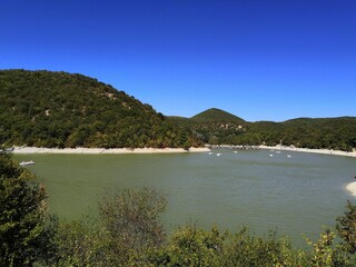 Fototapeta premium The sea behind the trees