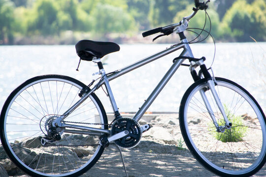 Bicycle on Path - Close up of Bicycle with Lake in the Background