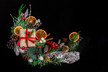 Obraz na płótnie Canvas beautiful bright christmas and new year composition on black background, greeting card. Flat lay, copy space, top view