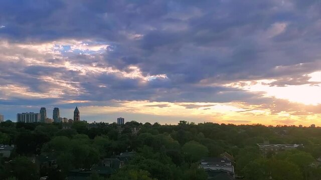 Panoramic time-lapse of Toronto sky and upscale Eglinton and Forest Hill residential area coveted by middle and upper class families as well as Ontario developers