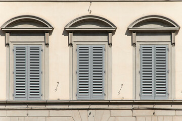 Fototapeta na wymiar Building facade in the city of Florence, Tuscany, Italy