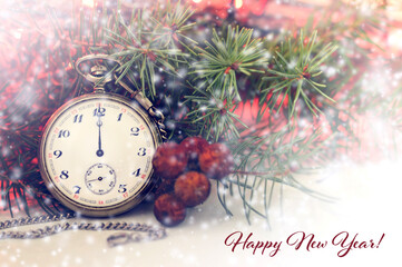 Fototapeta na wymiar New Year midnight clock and Happy New Year greeting
