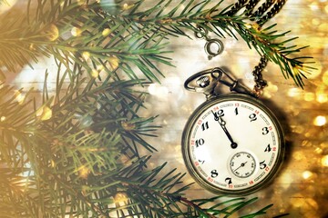 New Year midnight clock on shiny background