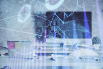 Multi exposure of financial graph drawing and office interior background. Concept of market analysis.