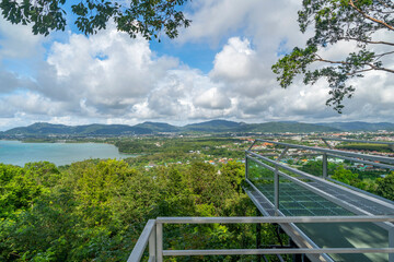 Fototapeta na wymiar Terrace with a beautiful landscape scenery view of Tropical sea and mountain blue sky white clouds in Phuket Thailand.