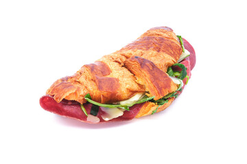 Croissant bun sandwich with parmesan cheese, bresaola cold cut and green salad closeup, isolated on white background. Great for fresh breakfast or as a quick lunch meal during office time.