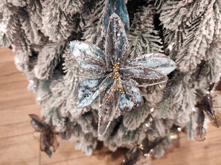 Blue floral decoration on Christmas tree