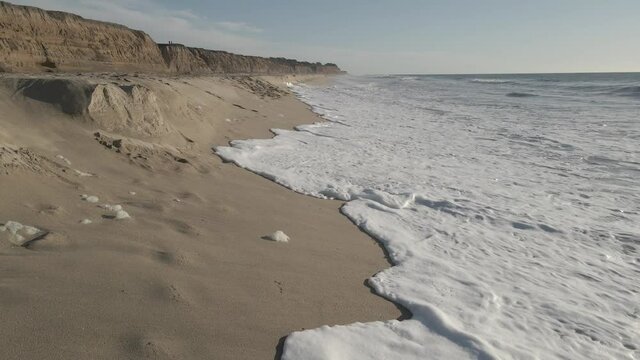 Steadicam along the beach in California