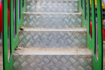 checkered steel stairs on the playground