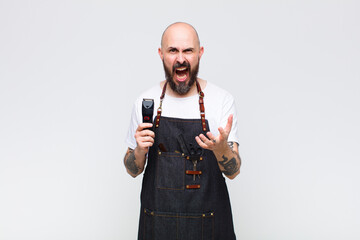 bald man looking angry, annoyed and frustrated screaming wtf or what’s wrong with you
