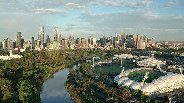 Aerial video of Melbourne sporting venues and CBD at sunrise