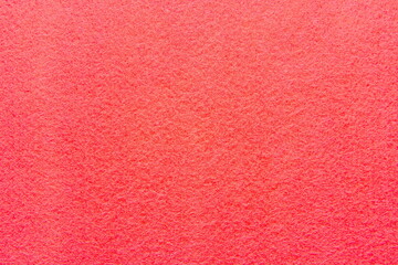 Abstract background of intense red felt material. Structure of red texture, velvet fabric, full...