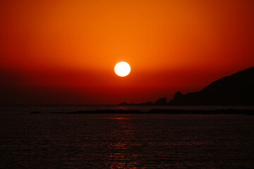 天草の牛深海岸から見た夕日