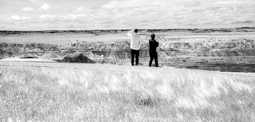 couple walking in the Badlands National Park