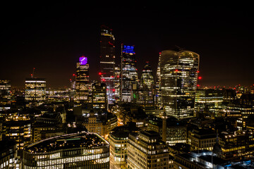 Fototapeta na wymiar London city skyline at night drone view 